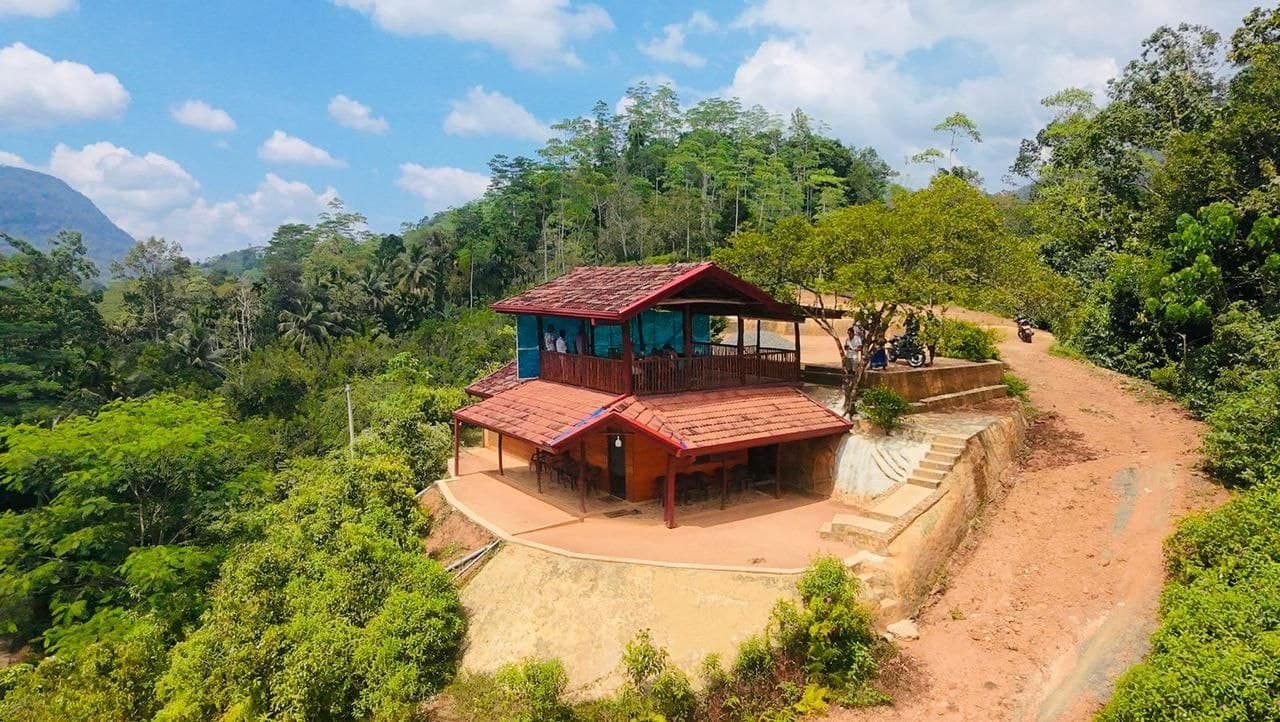 Scenic aerial view of our cabana amidst misty mountains